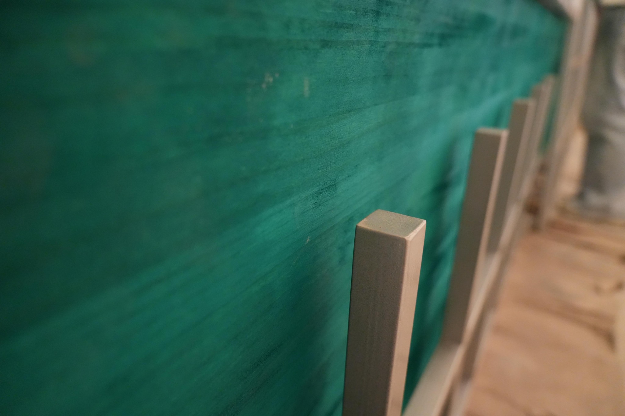 Baan Thai Canteen construction: stained green panels and timber stud